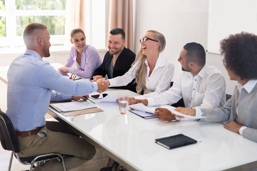 A team conducting interviews or candidate assessments in a professional setting