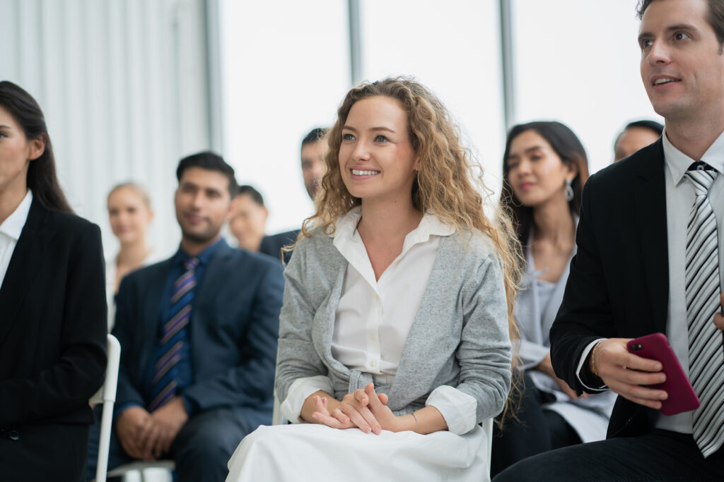 A team participating in a leadership development seminar or personal growth workshop
